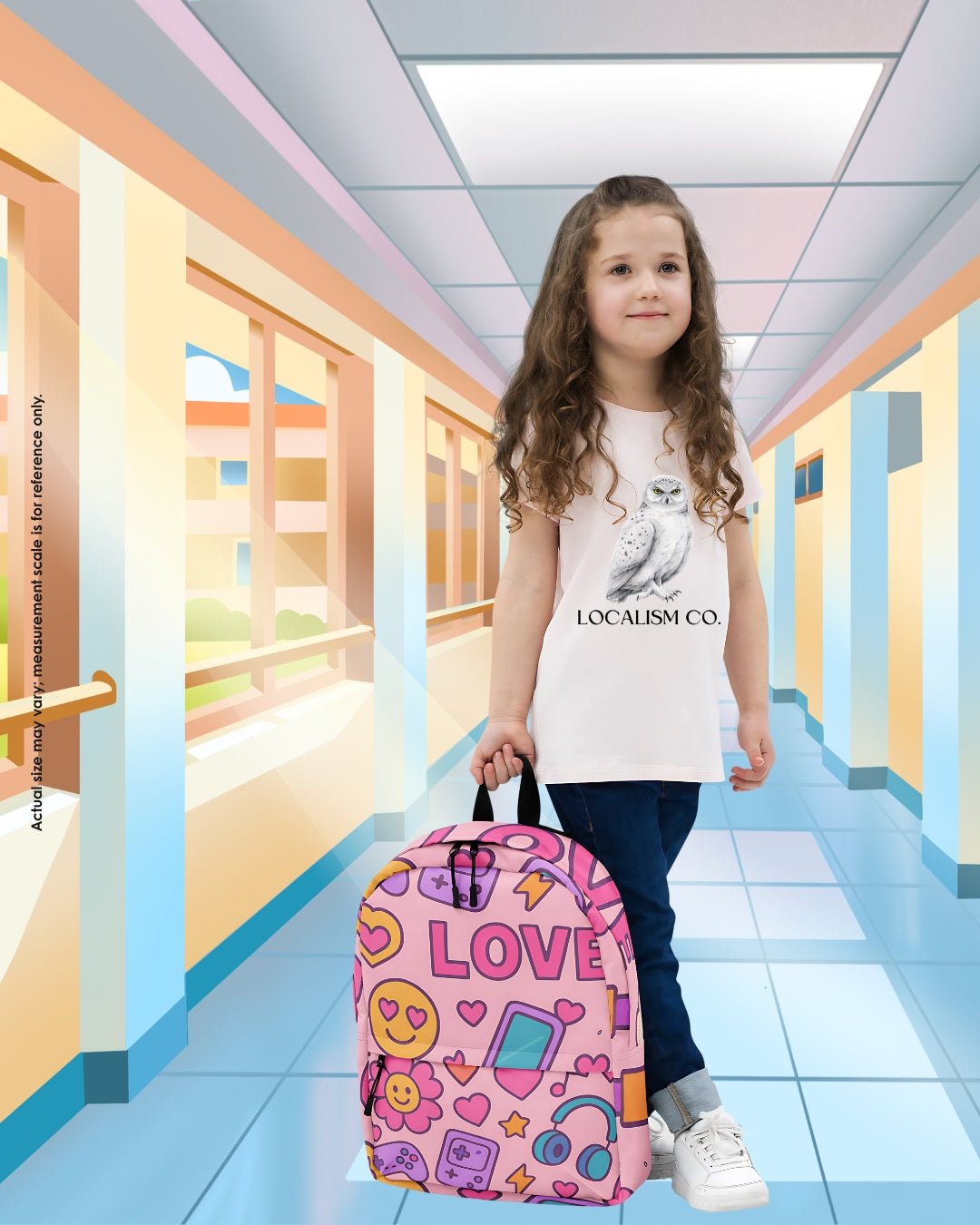 Smiling school girl wearing Localism Co. owl t-shirt holding a pastel pink ‘LOVE’ backpack decorated with Gen Alpha icons like hearts, emojis, headphones, and rainbows — perfect back-to-school gear for stylish girls aged 5–12 in Canada and the US.